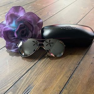 Coach Aviator sunglasses.